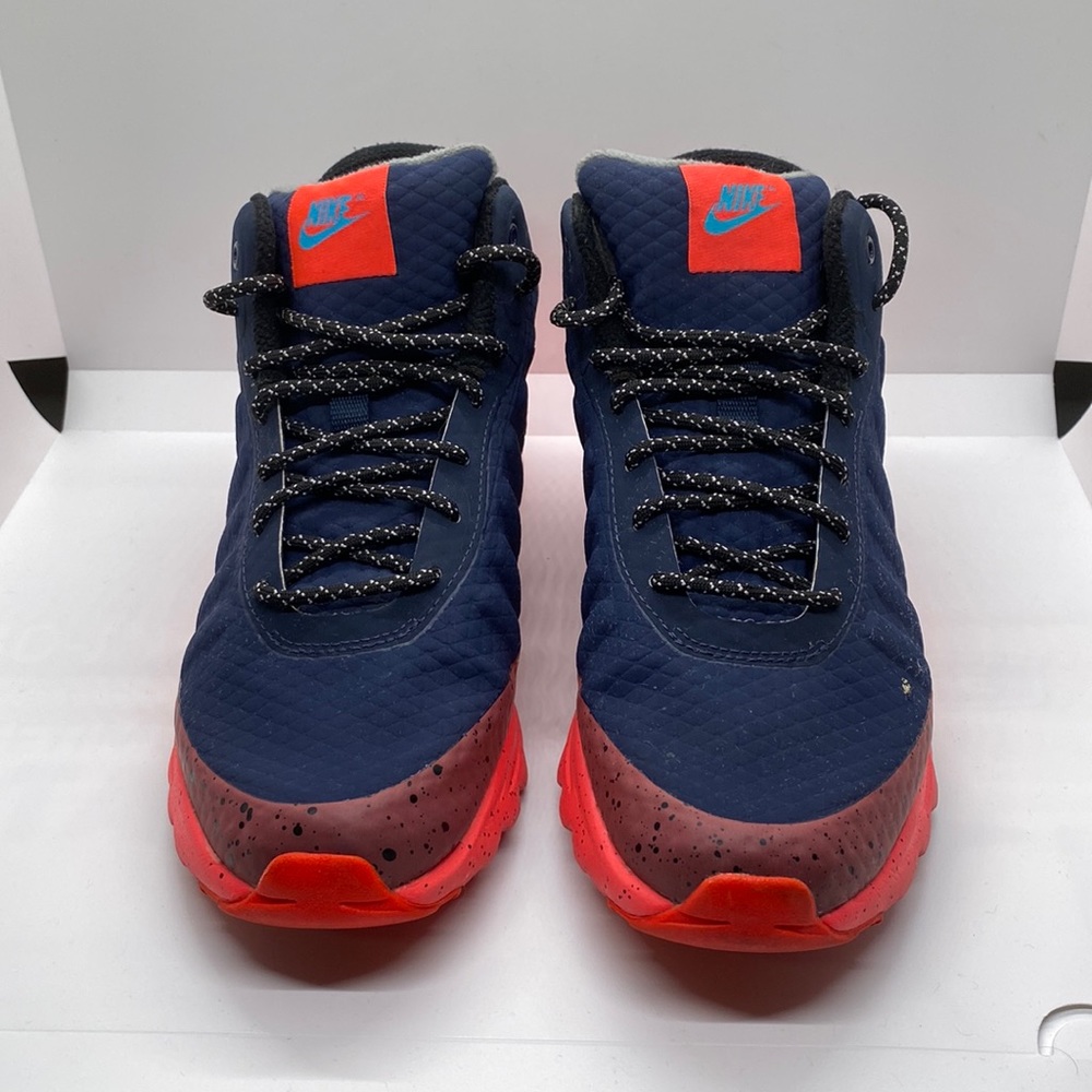 Nike Air Max Invigor Mid
Obsidian Solar Red